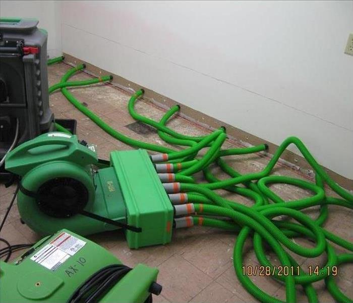 Green Injectidry on the floor. 
